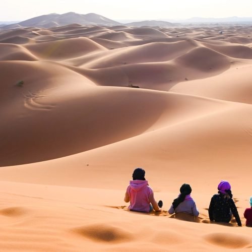 Family-of-4-enjoying-their-holiday-in-Merzouga-Desert-1500x1000